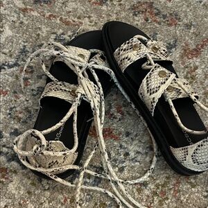 BCBGeneration Snakeskin Black Sandals